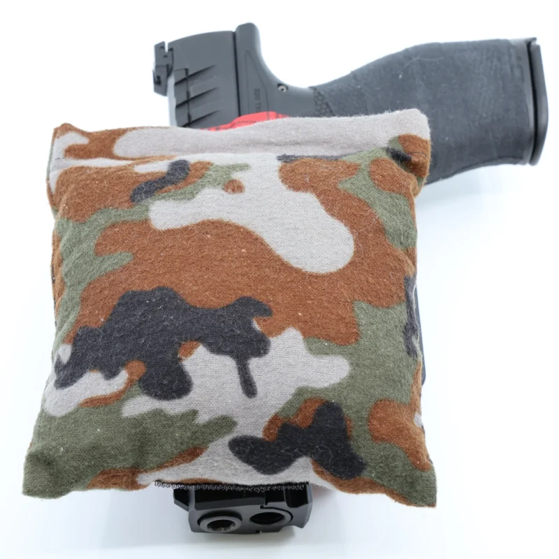 Cloudster Pillow Camo Monster holster wedge in front of an IWB holster