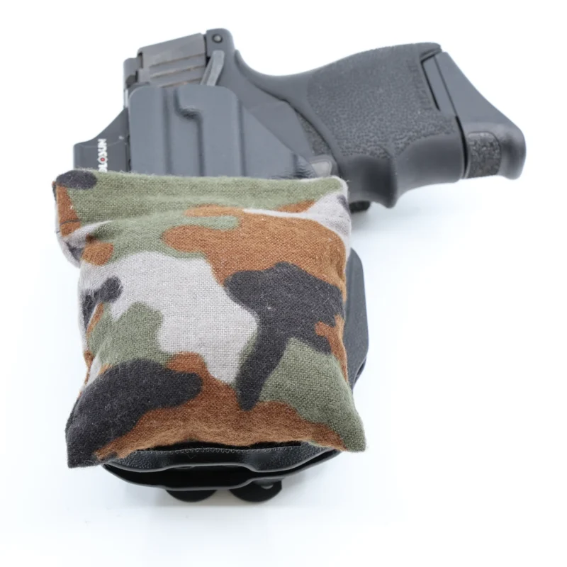 Cloudster Pillow Camo Standard holster wedge in front of an IWB holster