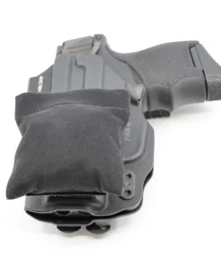Cloudster Pillow Dark Mini holster wedge in front of an IWB holster