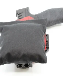 Cloudster Pillow Dark Monster holster wedge in front of an IWB holster