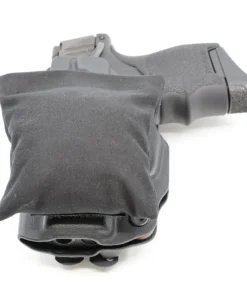 Cloudster Pillow Dark Standard holster wedge in front of an IWB holster