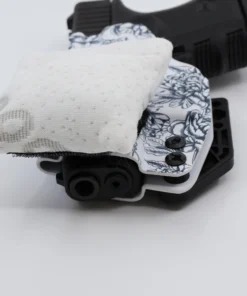 Cloudster Pillow White Mini holster wedge in front of an IWB holster