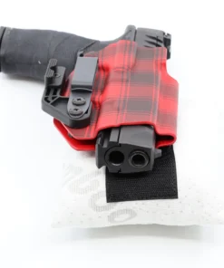 Cloudster Pillow White Monster holster wedge mounted on the back of an IWB holster
