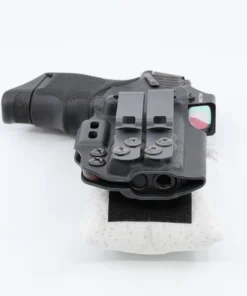 Cloudster Pillow White Standard holster wedge mounted on the back of an IWB holster