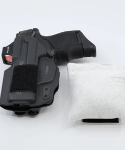 Cloudster Pillow White Standard holster wedge beside an IWB holster
