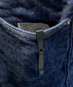 Cloudster Pocket Mag Carrier in front pocket with Glock magazine baseplate visible at top