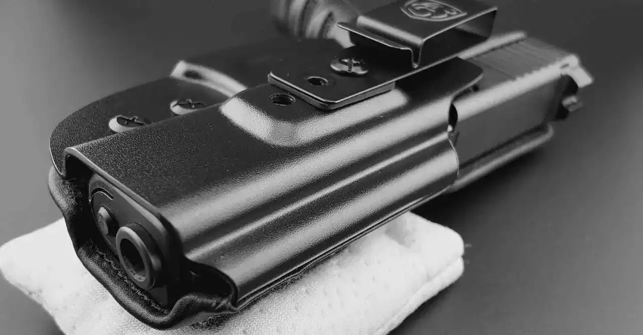 Black gun holster with Cloudster Pillow for secure concealed carry.