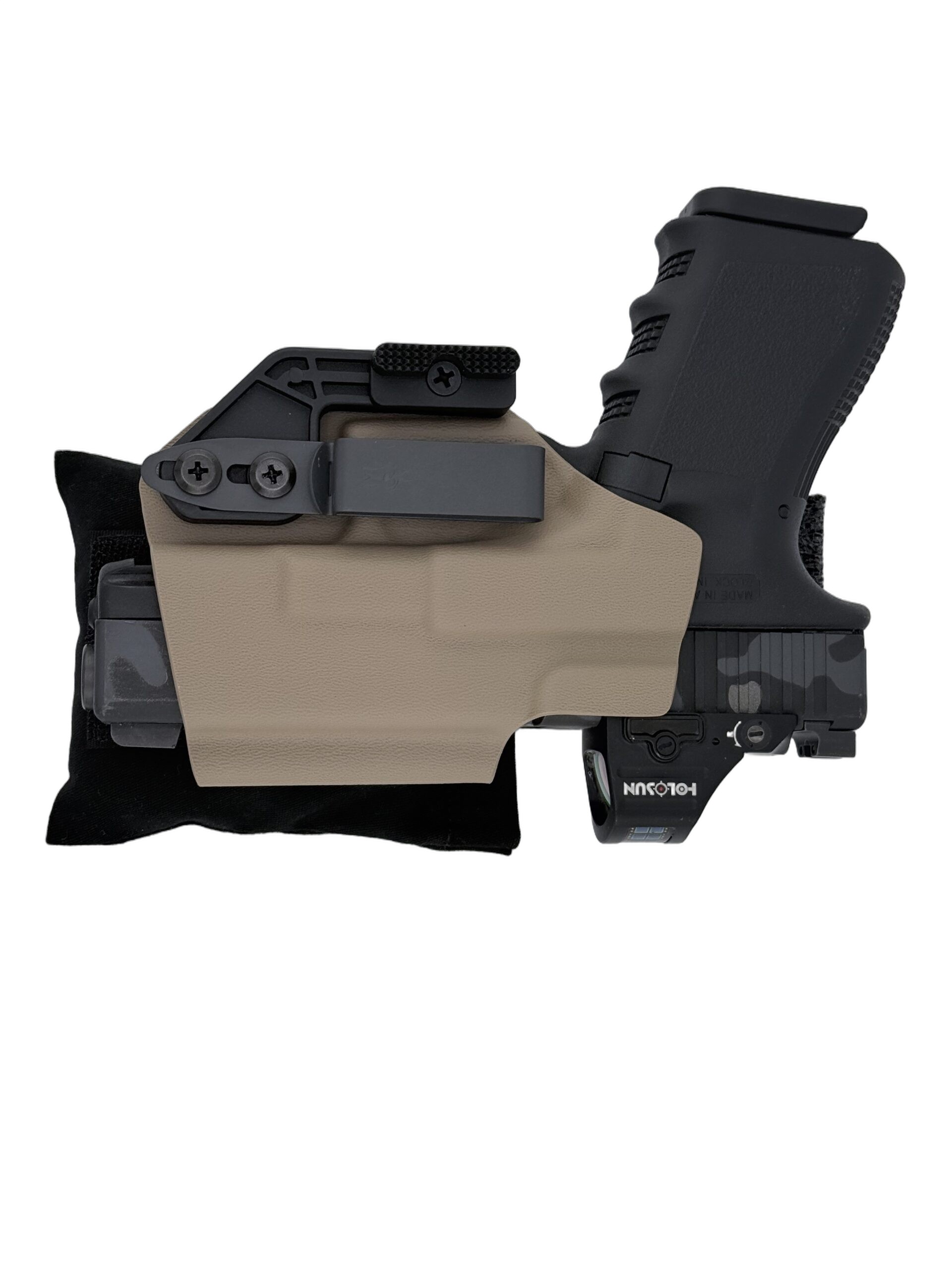 Cloudster Pillow Dark Deluxe holster wedge with an FDE Kydex holster and red dot optic
