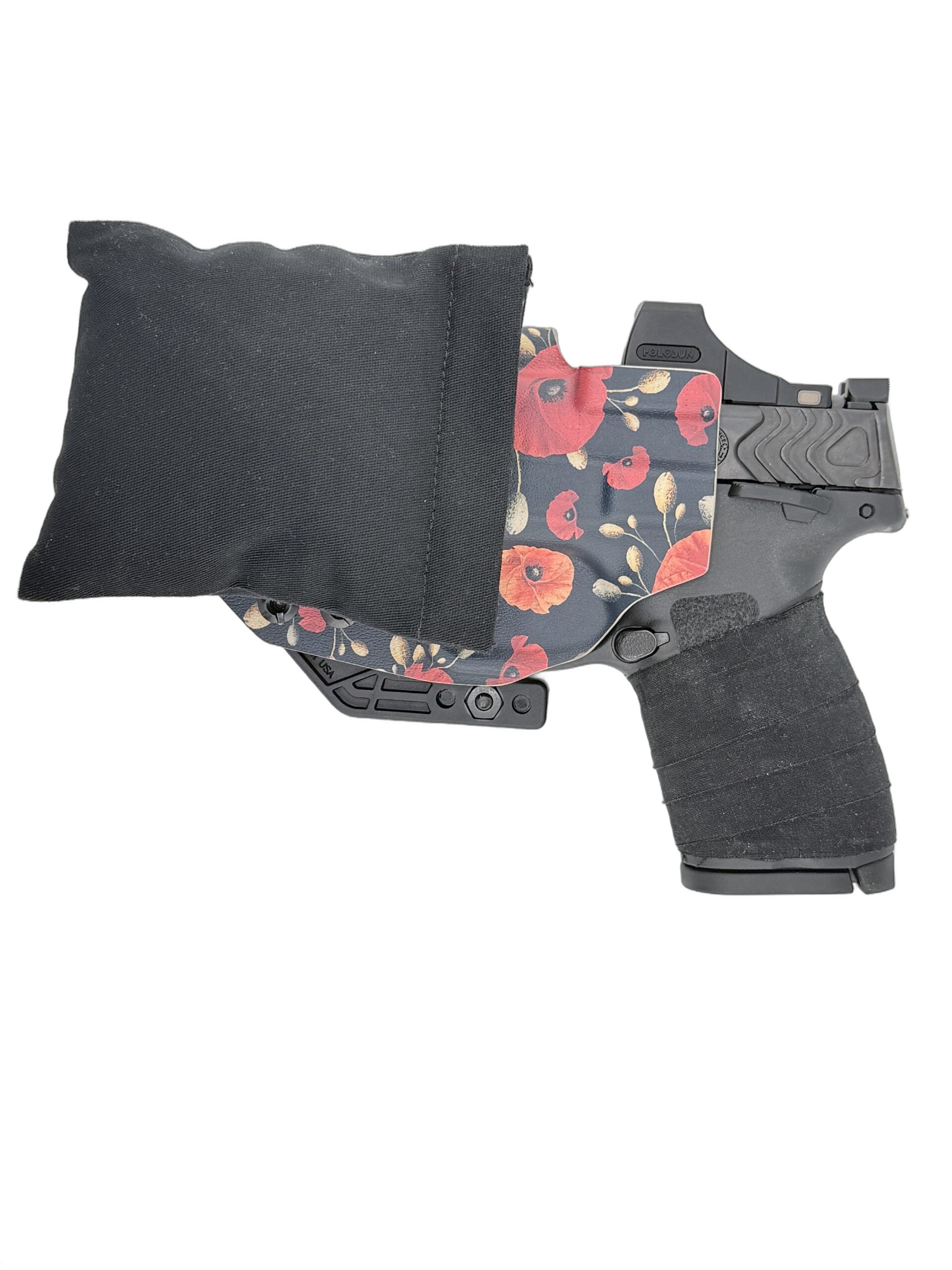 Cloudster Pillow Dark Deluxe holster wedge with a red floral Kydex holster and pistol