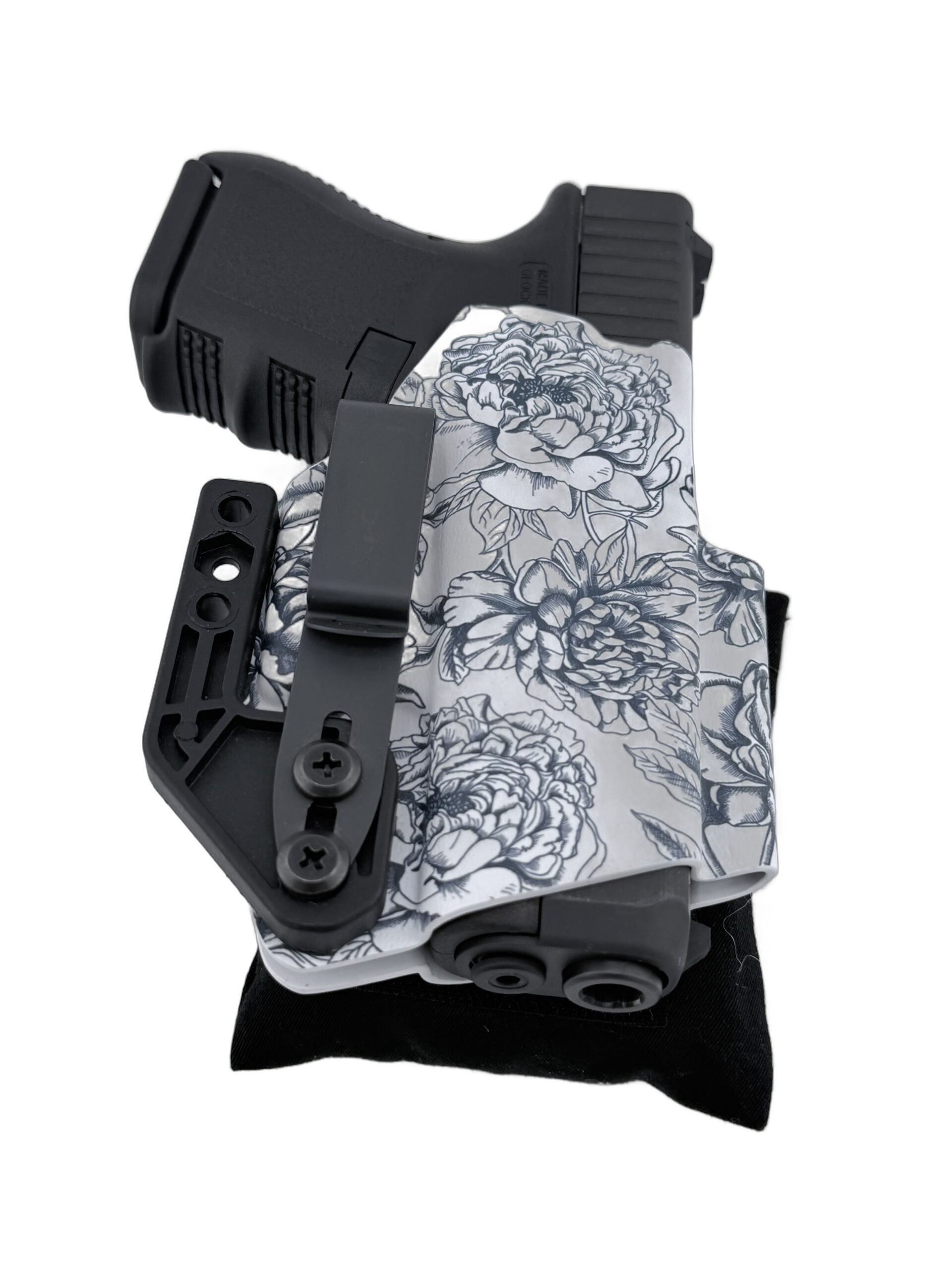 Cloudster Pillow Dark Standard holster wedge behind a floral Kydex Glock holster