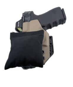 Cloudster Pillow Dark Standard holster wedge with an FDE Kydex holster and Glock
