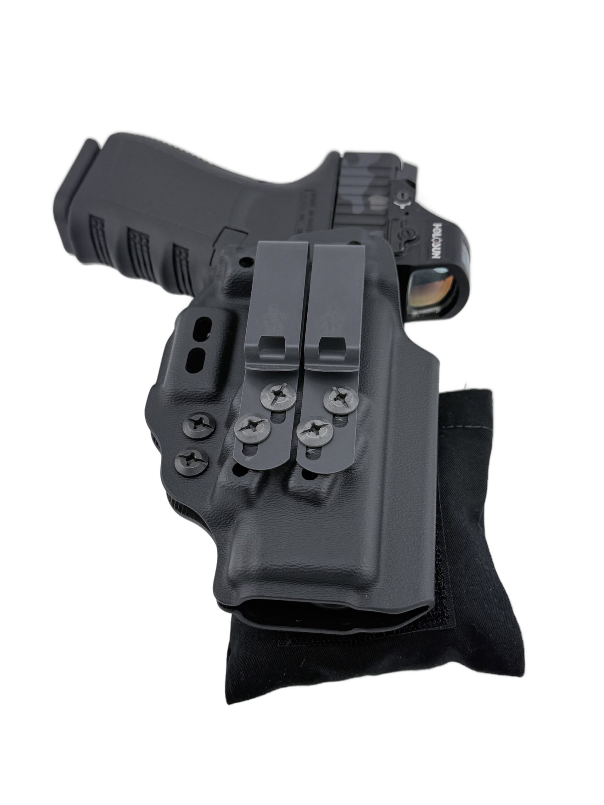 Cloudster Pillow Dark Standard holster wedge on a black tactical Kydex holster