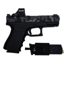 Cloudster Pocket Mag Carrier shown with a pistol