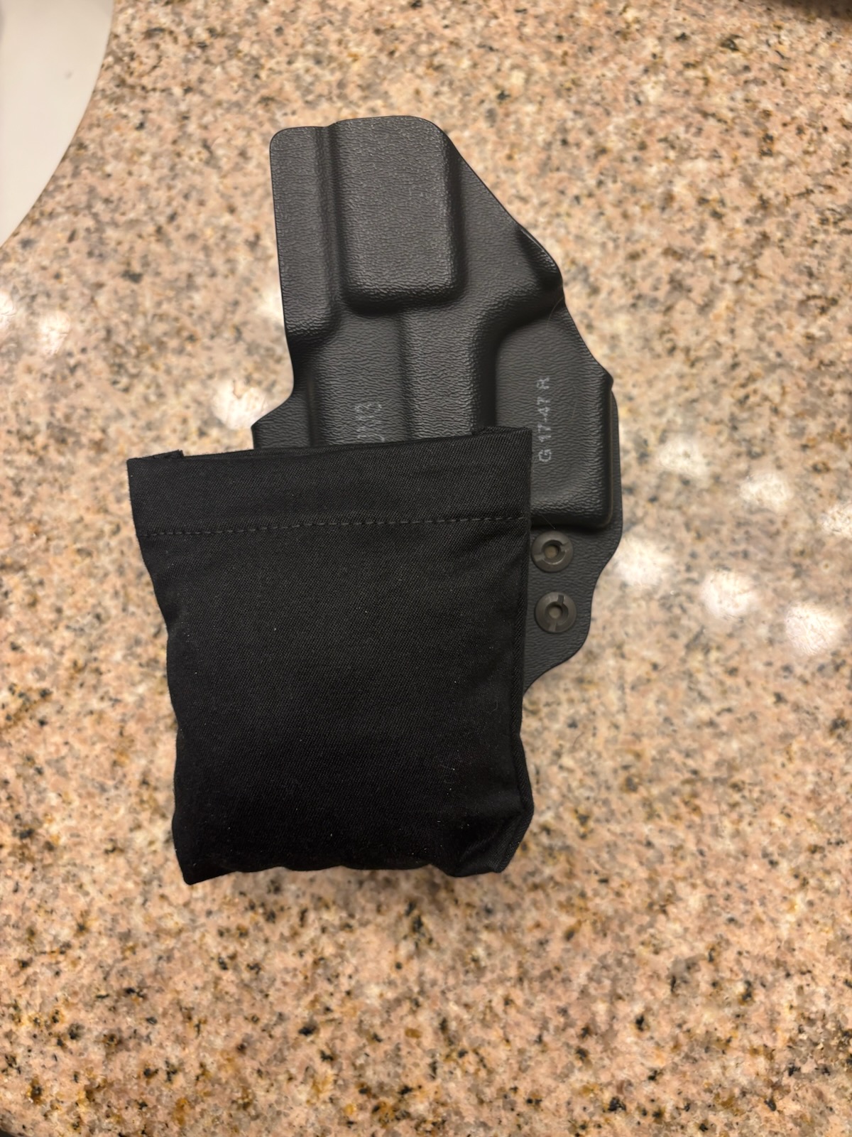 Cloudster Pillow holster pad velcroed to the back of a kydex IWB holster