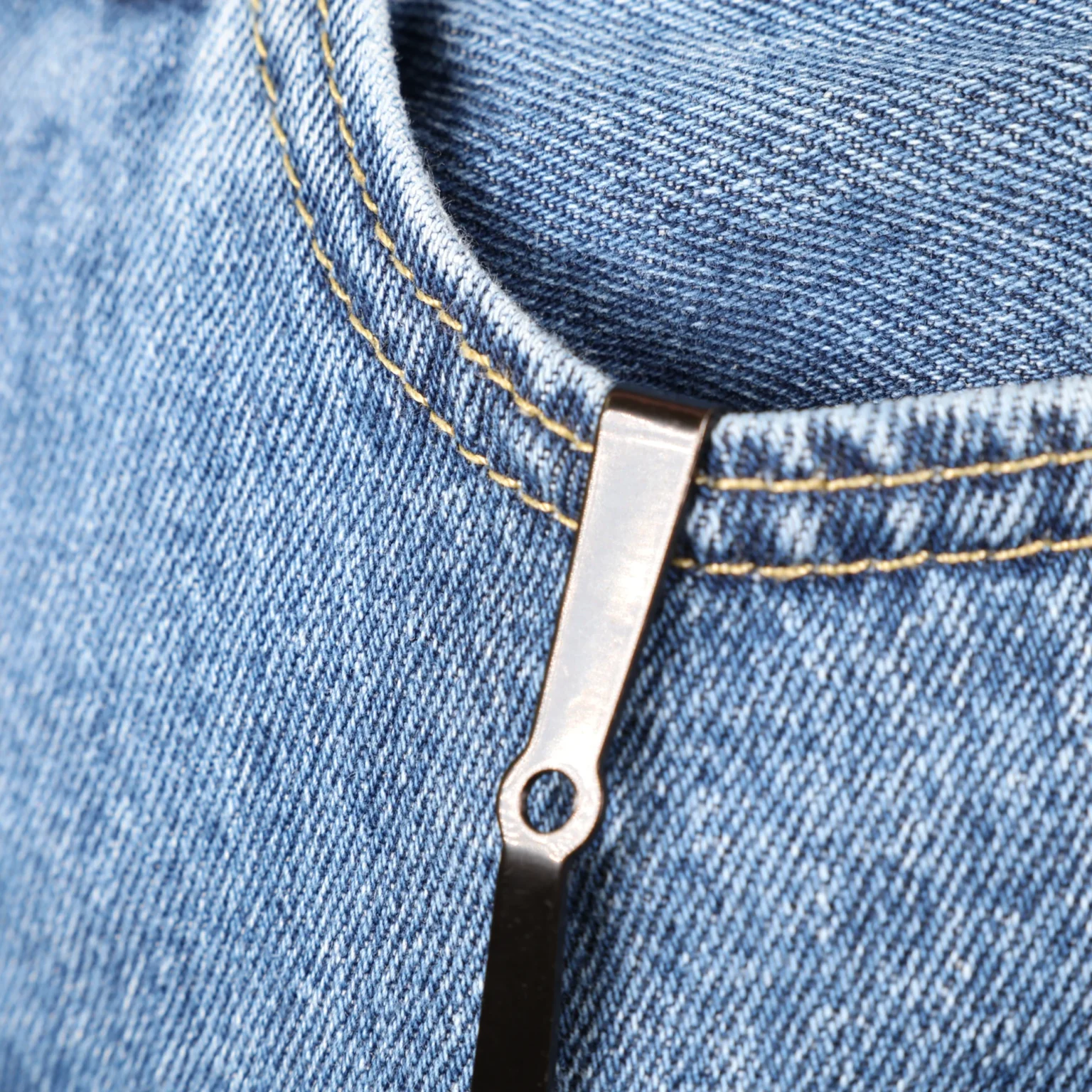 Cloudster .45 ACP Magnetic Pocket Mag Carrier carried in a jeans pocket - only the clip shows