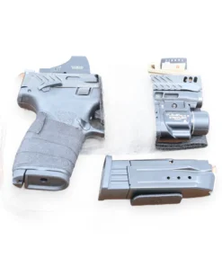 Cloudster 9mm Magnetic Sling Bag Mag Carrier with pistol laid in a sling bag