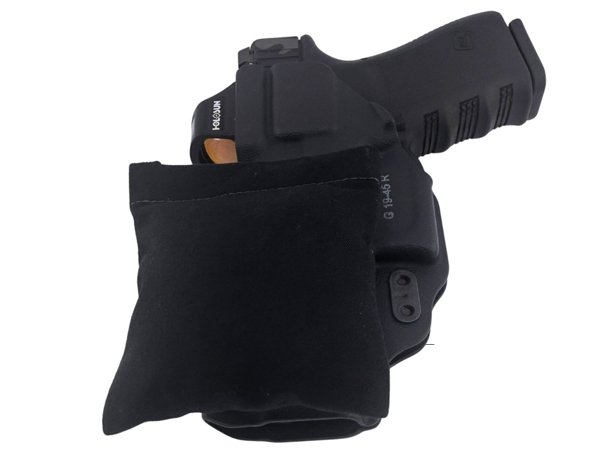 Cloudster Pillow tucked behind a black kydex AIWB holster with an optic-cut pistol