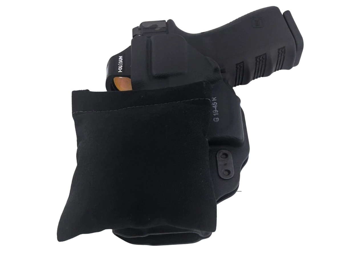 Kydex IWB holster with a pistol and the Cloudster Pillow attached behind