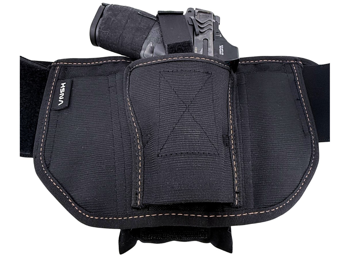 Cloudster Pillow tucked behind a black VNSH holster with a pistol