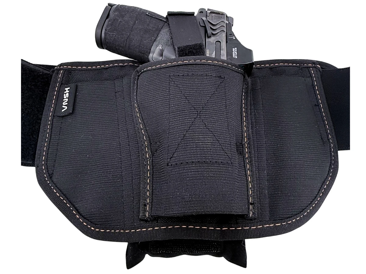 Smith & Wesson M&P 2.0 Carry Comp in a black bellyband holster with the Cloudster Pillow tucked behind